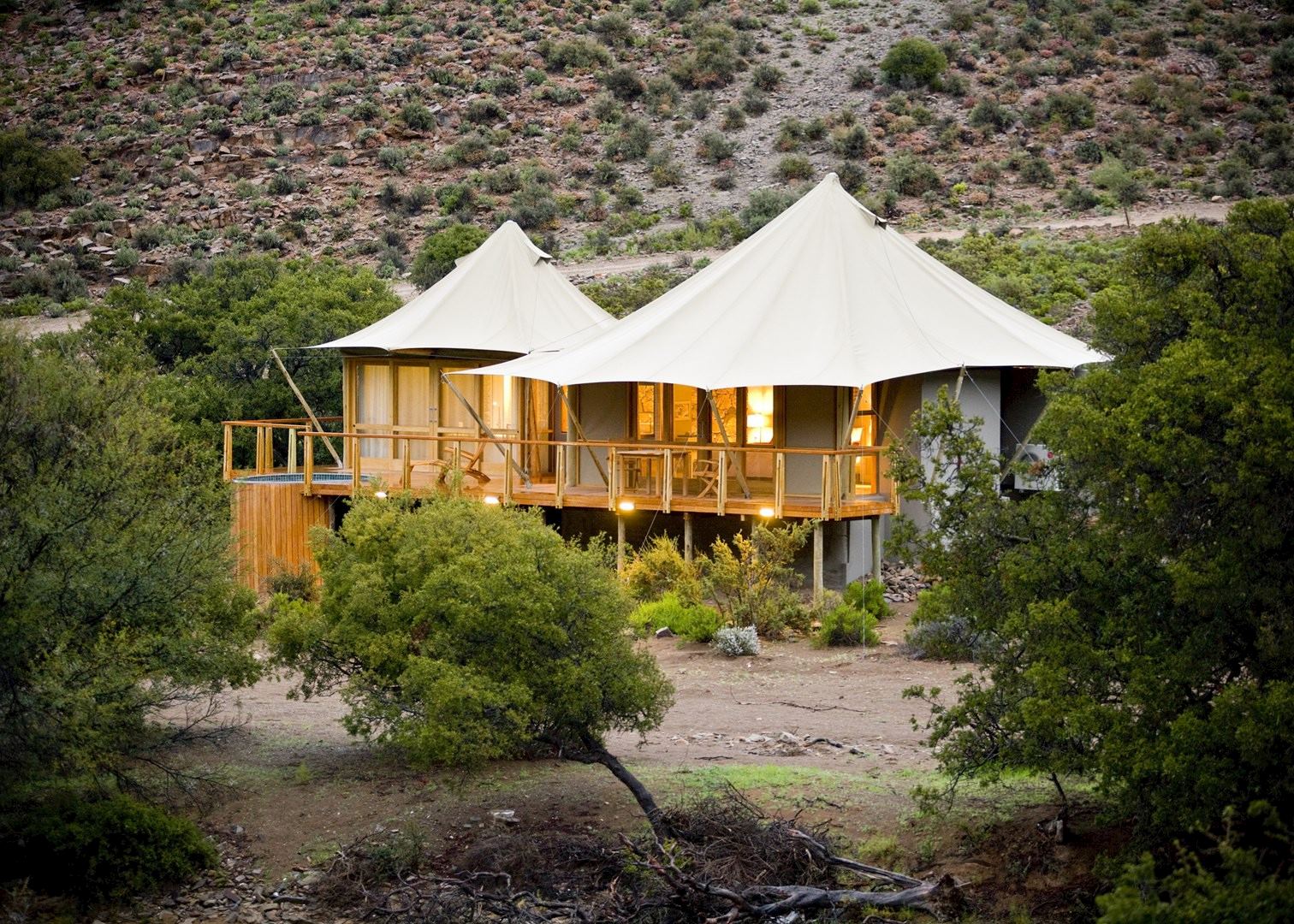 Safari-style accommodation surrounded by natural South African scenery